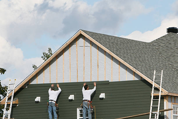 Professional Emergency Siding Repair technician working in Blanchester, OH
